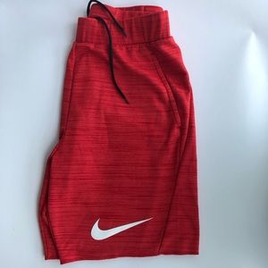 Nike, red dri-fit shorts. Size M.